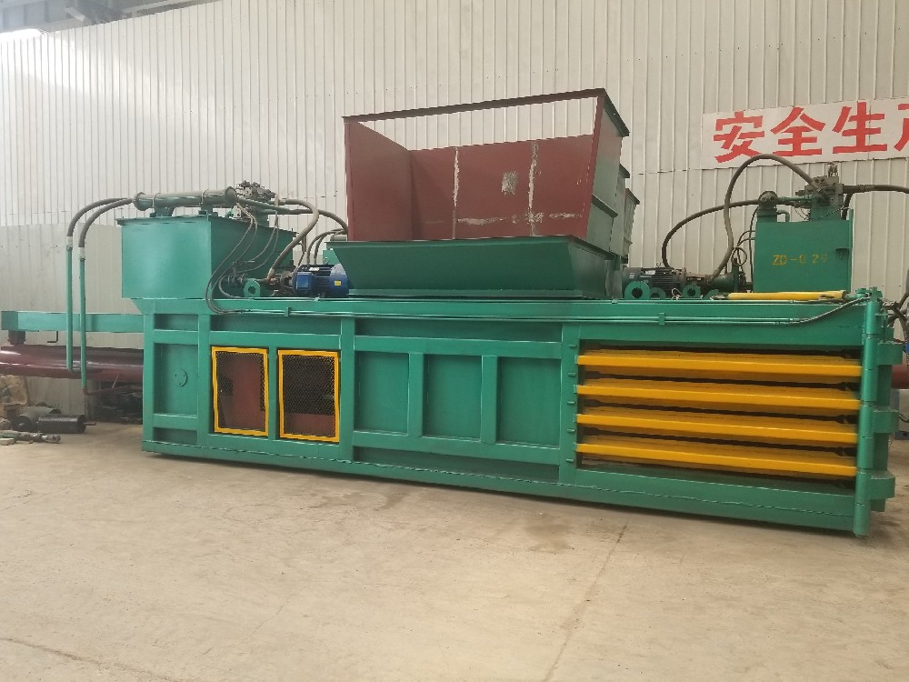 Waste paper baler