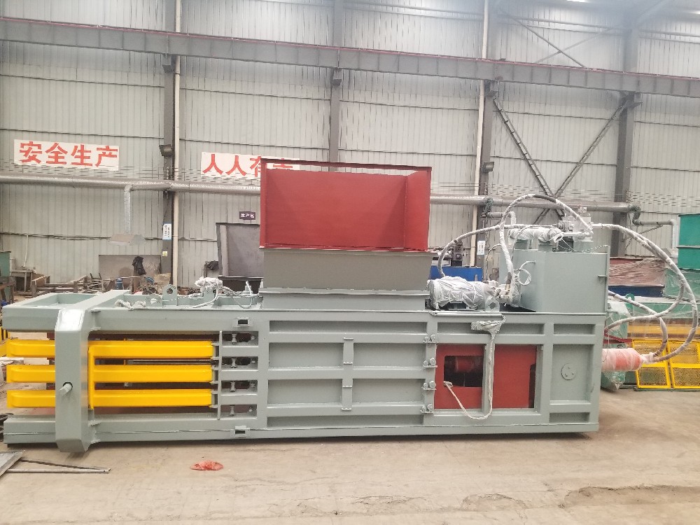 Automatic waste paper baler