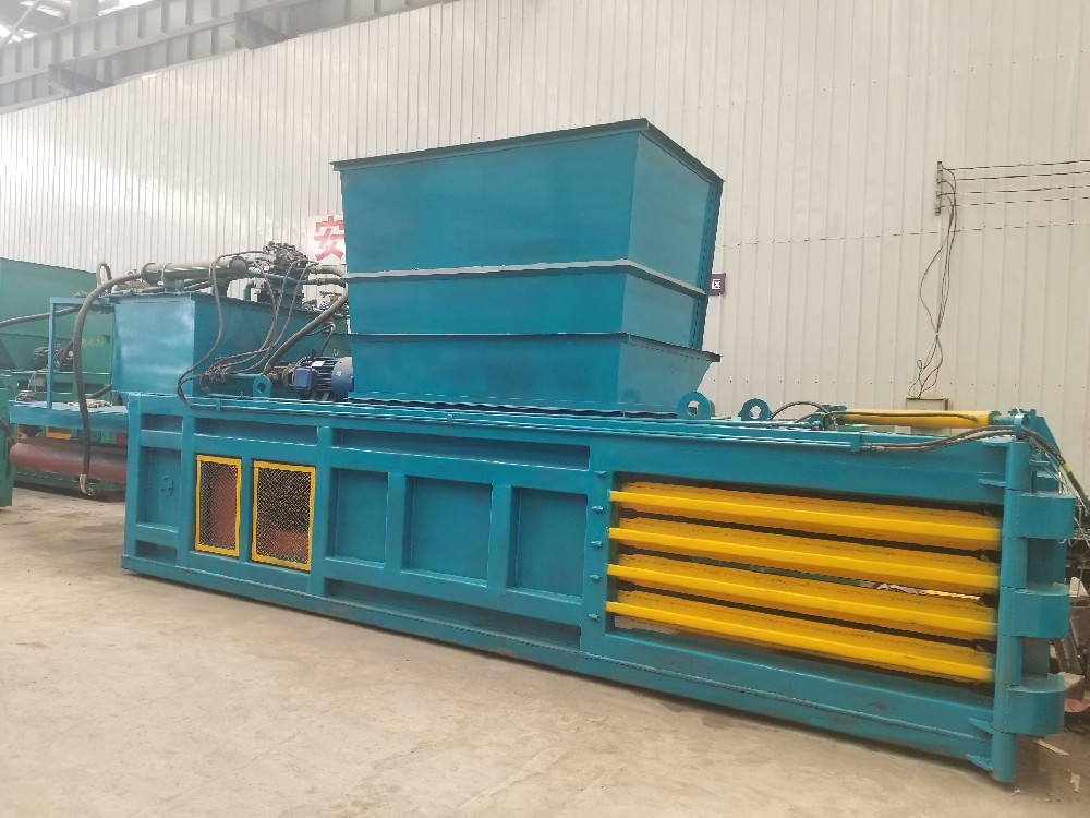 Plastic bottle baler